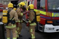 Crews extinguish garage fire on Macclesfield Road