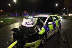 Driver of stolen vehicle deliberately rams police car