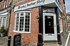 Barber shop celebrates 20 years