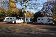 Travellers camp in village car park