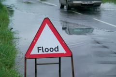 Flood warning coincides with hosepipe ban