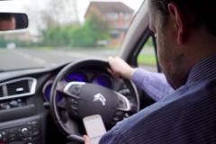 Clampdown on people using mobile phones at the wheel