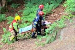 Fire crew rescue man from embankment in Alderley Edge