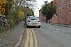 Triple yellow lines to solve parking problems