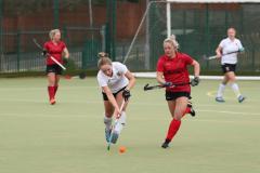 Hockey: Edge weather the wind to win