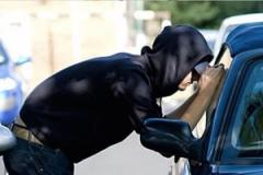 Handbag stolen from parked car