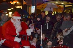 Crowds brave the rain for Christmas lights switch on