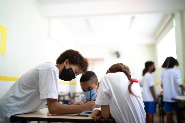 Children wearing facemasks in class